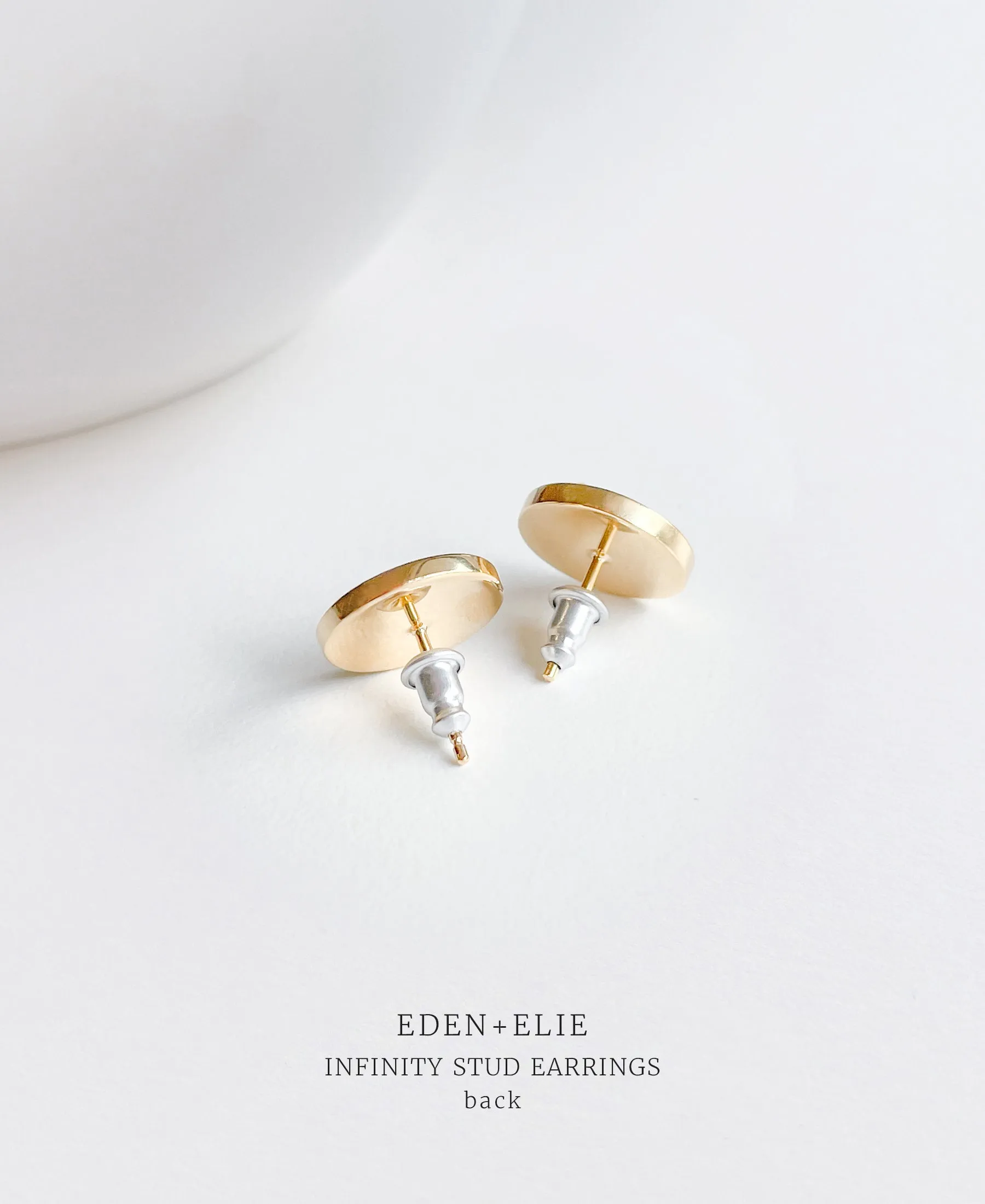 EDEN   ELIE Infinity stud earrings - pollen